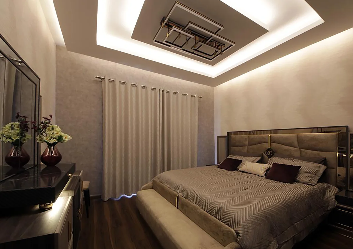 Warm bedroom with decorative ceiling