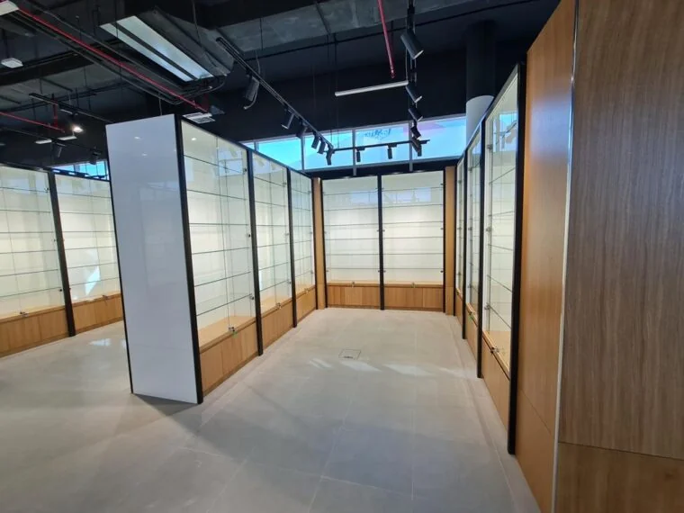 Glass and timber interior partitions with coordinated ceiling services